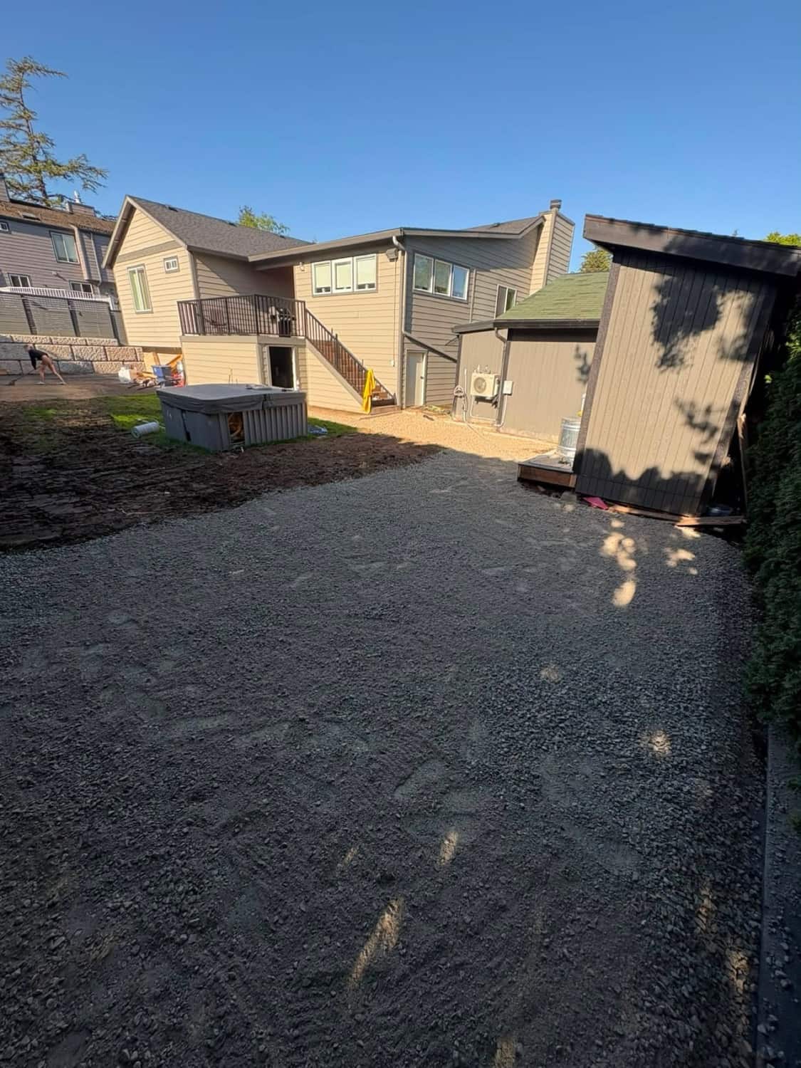 Foundation excavation with drainage and waterproofing work.